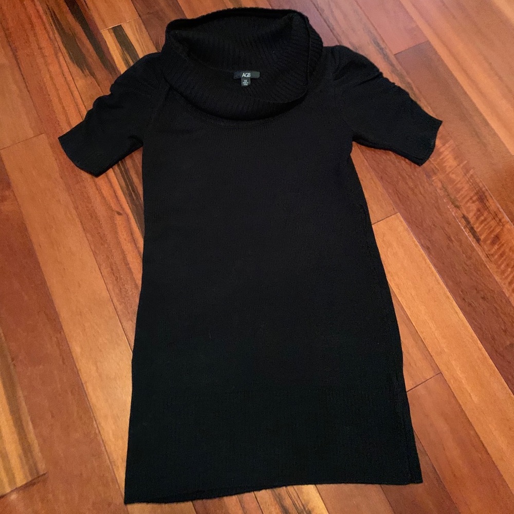 Short black sweater dress.